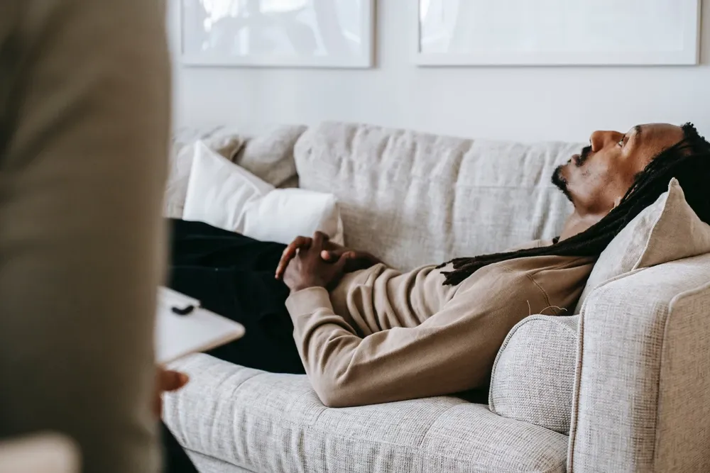 teenager in therapist's office